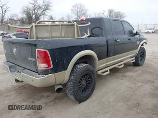 2013 Ram 2500 Longhorn with VIN 3C6UR5PL8DG535266, listed as a IAAI auction lot 41656359 with 202,487 mi miles and . Bid and sale history available at DreamBid. Image 4.