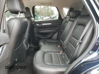 2019 Mazda CX-5 Grand Touring with VIN JM3KFADM0K1596256, listed as a Copart auction lot 86323594 with 118,853 mi miles and Salvage title. Bid and sale history available at DreamBid. Image 11.
