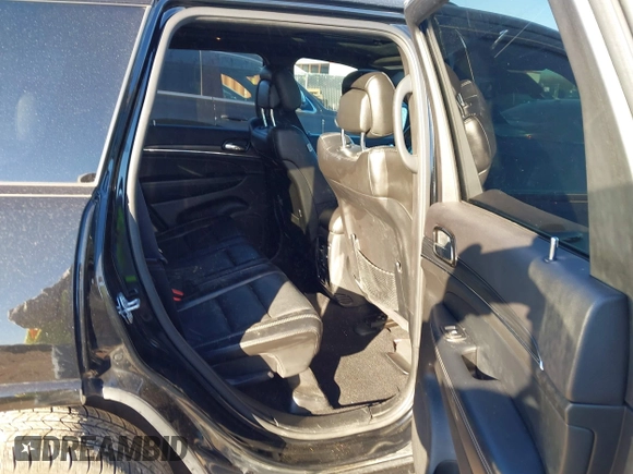 2021 Jeep Grand Cherokee 80th Anniversary with VIN 1C4RJFBG9MC527654, listed as a IAAI auction lot 41212055 with 92,436 mi miles and . Bid and sale history available at DreamBid. Image 8.
