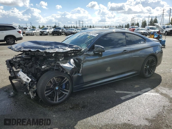2016 BMW M4 with VIN WBS3R9C59GK337983, listed as a Copart auction lot 40714144 with 38,933 mi miles. Bid and sale history available at carsss.com. Image 1.