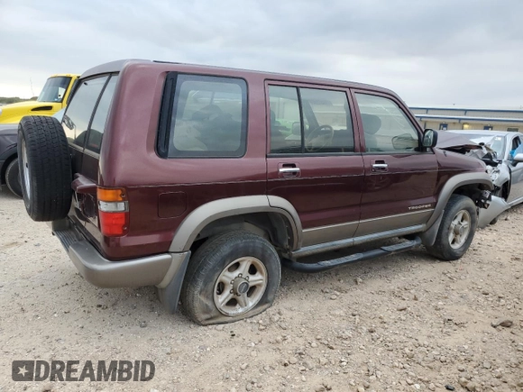 2000 Isuzu Trooper S with VIN JACDJ58X3Y7J09857, listed as a Copart auction lot 79924354 with Not provided miles and Clean title. Bid and sale history available at DreamBid. Image 3.
