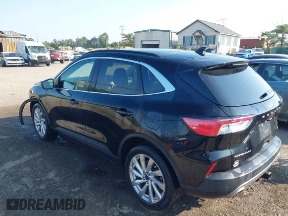 2021 Ford Escape Titanium Hybrid with VIN 1FMCU9DZ0MUB14833, listed as a IAAI auction lot 42593983 with 51,852 mi miles and . Bid and sale history available at DreamBid. Image 3.