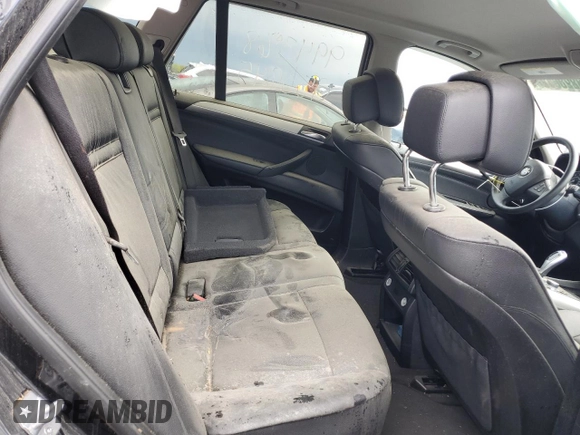 2013 BMW X5 xDrive35i z VIN 5UXZV4C5XD0G53045, wystawiony jako Copart lot #52986625 z przebiegiem 130 237 mil mil oraz Czysty tytuł • Clean title. Historia ofert i sprzedaży dostępna na DreamBid. Obrazek 11.