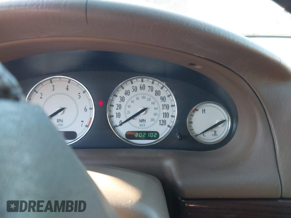 2000 Chrysler LHS with VIN 2C3HC56G4YH222936, listed as a IAAI auction lot 41453912 with 202,102 mi miles. Bid and sale history available at carsss.com. Image 7.