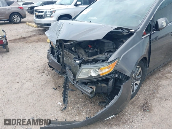 2015 Honda Odyssey Touring Elite with VIN 5FNRL5H99FB089642, listed as a IAAI auction lot 42591786 with 100,755 mi miles and . Bid and sale history available at DreamBid. Image 6.