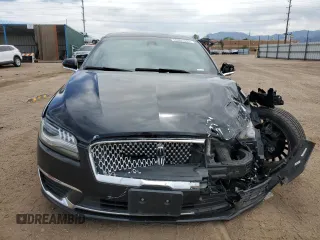 2017 Lincoln MKZ Reserve z VIN 3LN6L5EC6HR643638, wystawiony jako Copart lot #56601365 z przebiegiem 75 446 mil mil oraz Szkoda całkowita • Salvage title. Historia ofert i sprzedaży dostępna na DreamBid. Obrazek 5.