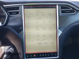2014 Tesla Model S 60 with VIN 5YJSA1H14EFP57209, listed as a IAAI auction lot 41305157 with 141,364 mi miles and . Bid and sale history available at DreamBid. Image 19.