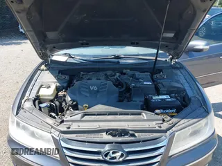 2011 Hyundai Azera Limited with VIN KMHFC4DF1BA552350, listed as a IAAI auction lot 42628519 with 295,296 mi miles and . Bid and sale history available at DreamBid. Image 10.