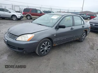 2006 Mitsubishi Lancer ES with VIN JA3AJ26E76U066867, listed as a IAAI auction lot 41904428 with 247,460 mi miles. Bid and sale history available at carsss.com. Image 2.