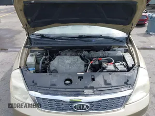 2011 Kia Sedona LX with VIN KNDMG4C71B6407306, listed as a IAAI auction lot 41922697 with 243,248 mi miles. Bid and sale history available at carsss.com. Image 10.