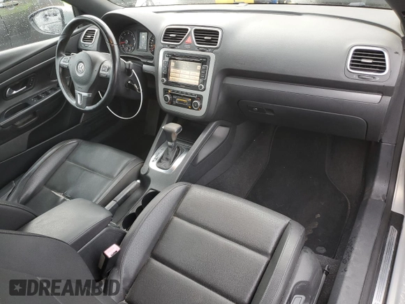 2010 Volkswagen Eos Komfort с VIN WVWBA7AH1AV016859, выставлен на аукционе Copart как лот 49053605 с пробегом 98 557 миль миль и Чистый • Clean title. История ставок и продаж доступна на DreamBid. Изображение 8.