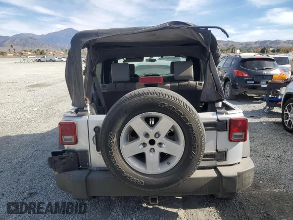 2007 Jeep Wrangler Unlimited X with VIN 1J8GB39157L142982, listed as a Copart auction lot 82050134 with 72,666 mi miles and Salvage Title. Bid and sale history available at DreamBid. Image 6.