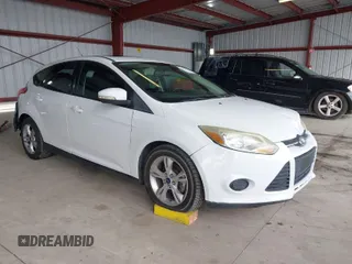 2014 Ford Focus SE with VIN 1FADP3K21EL301336, listed as a IAAI auction lot 41939452 with 118,203 mi miles. Bid and sale history available at carsss.com. Image 1.