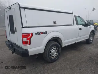 2018 Ford F-150 XL with VIN 1FTMF1EB1JKE19030, listed as a IAAI auction lot 42233745 with 193,352 mi miles and . Bid and sale history available at DreamBid. Image 4.