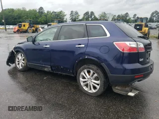 2011 Mazda CX-9 Grand Touring with VIN JM3TB2DA0B0320628, listed as a Copart auction lot 56310725 with 119,068 mi miles and Salvage title. Bid and sale history available at DreamBid. Image 2.