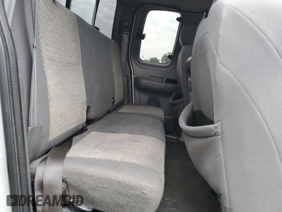 2003 Ford F-150 XL z VIN 2FTRX18L93CA55860, wystawiony jako Copart lot #57402295 z przebiegiem 312 879 mil mil oraz Szkoda całkowita • Salvage title. Historia ofert i sprzedaży dostępna na DreamBid. Obrazek 10.