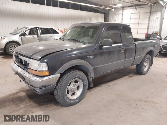 2000 Ford Ranger XLT with VIN 1FTZR15X2YPB86720, listed as a IAAI auction lot 41501141 with 211,794 mi miles. Bid and sale history available at carsss.com. Image 17.