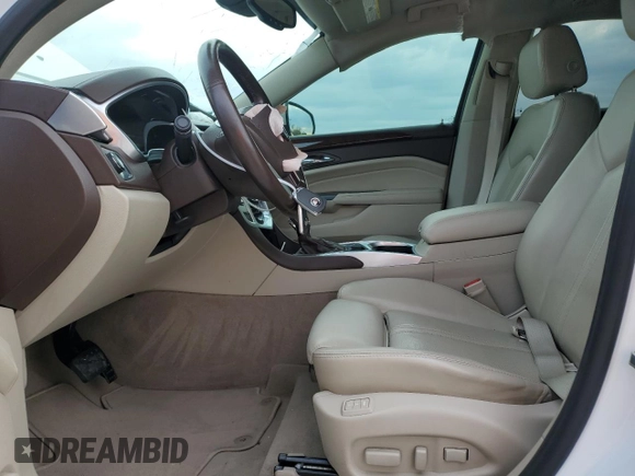 2016 Cadillac SRX Premium Collection with VIN 3GYFNDE37GS550329, listed as a Copart auction lot 80622514 with 77,910 mi miles and Salvage title. Bid and sale history available at DreamBid. Image 7.