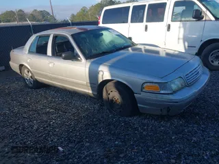 2005 Ford Crown Victoria LX z VIN 2FAFP74W95X166416, wystawiony jako IAAI lot #41526872 z przebiegiem 195 589 mil mil oraz . Historia ofert i sprzedaży dostępna na DreamBid. Obrazek 1.