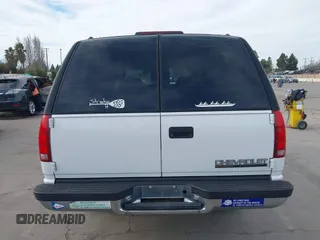 1997 Chevrolet Suburban with VIN 3GNFK16R9VG187426, listed as a IAAI auction lot 41678063 with 131,387 mi miles. Bid and sale history available at carsss.com. Image 16.