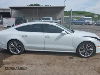 2016 Audi A7 Prestige with VIN WAU2GAFC4GN043343, listed as a IAAI auction lot 42380383 with 75,087 mi miles and . Bid and sale history available at DreamBid. Image 14.