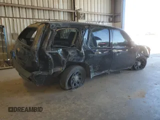 2013 Chevrolet Tahoe Commercial with VIN 1GNLC2E01DR190568, listed as a Copart auction lot 49525875 with 87,872 mi miles and Salvage title. Bid and sale history available at DreamBid. Image 3.