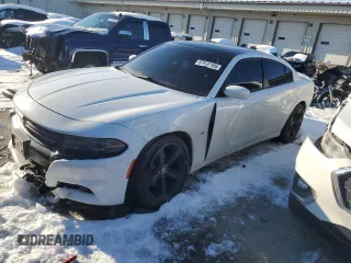2018 Dodge Charger GT with VIN 2C3CDXJG7JH144197, listed as a Copart auction lot 87977185 with 131,604 mi miles and Salvage Title. Bid and sale history available at DreamBid. Image 1.