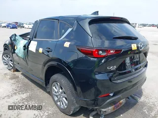 2024 Mazda CX-5 S Select with VIN JM3KFBBL1R0412779, listed as a IAAI auction lot 41932258 with Not Provided miles and . Bid and sale history available at DreamBid. Image 3.