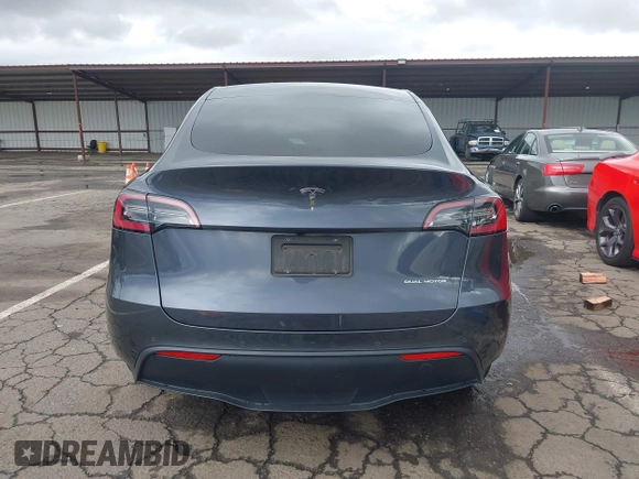 2022 Tesla Model Y Long Range with VIN 7SAYGDEE8NF317482, listed as a IAAI auction lot 41806043 with 32,108 mi miles and . Bid and sale history available at carsss.com. Image 17.