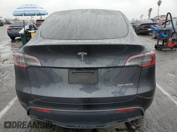 2025 Tesla Model Y Long Range with VIN 7SAYGAEE3SF216635, listed as a Copart auction lot 44614555 with 400 mi miles and Salvage Title. Bid and sale history available at DreamBid. Image 6.