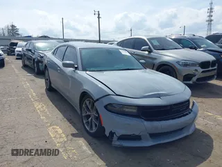 2020 Dodge Charger SXT with VIN 2C3CDXBG9LH232833, listed as a IAAI auction lot 41812035 with 63,391 mi miles. Bid and sale history available at carsss.com. Image 1.