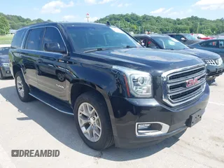 2019 GMC Yukon SLT z VIN 1GKS2BKC9KR157650, wystawiony jako IAAI lot #42380502 z przebiegiem 103 897 mil mil oraz . Historia ofert i sprzedaży dostępna na DreamBid. Obrazek 1.