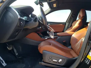 2020 BMW X4 M Competition z VIN 5YMUJ0C07L9B74720, wystawiony jako Copart lot #67831094 z przebiegiem 21 308 mil mil oraz Szkoda całkowita • Salvage title. Historia ofert i sprzedaży dostępna na DreamBid. Obrazek 7.