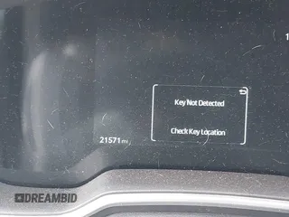 2023 Toyota Corolla Cross XLE with VIN 7MUEAABG8PV077117, listed as a IAAI auction lot 42052305 with 21,571 mi miles and . Bid and sale history available at DreamBid. Image 7.