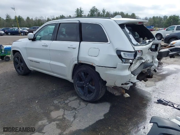 2015 Jeep Grand Cherokee Altitude with VIN 1C4RJFAG4FC942885, listed as a IAAI auction lot 41952356 with 233,276 mi miles. Bid and sale history available at carsss.com. Image 3.