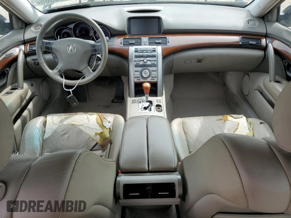 2006 Acura RL z VIN JH4KB165X6C011153, wystawiony jako Copart lot #53425365 z przebiegiem 197 781 mil mil oraz Szkoda całkowita • Salvage title. Historia ofert i sprzedaży dostępna na DreamBid. Obrazek 8.