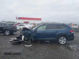 2022 Volkswagen Atlas SE z VIN 1V2HR2CA0NC561411, wystawiony jako IAAI lot #41941719 z przebiegiem Nie podano mil oraz . Historia ofert i sprzedaży dostępna na DreamBid. Obrazek 14.