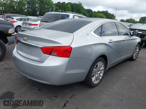 2015 Chevrolet Impala LS with VIN 2G11X5SL6F9132093, listed as a IAAI auction lot 42524881 with 324,909 mi miles and . Bid and sale history available at DreamBid. Image 4.