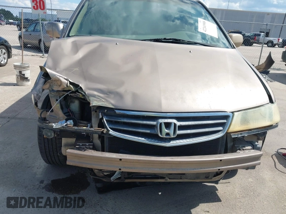 2003 Honda Odyssey EX-L z VIN 5FNRL18993B116892, wystawiony jako IAAI lot #42241908 z przebiegiem 276 223 mil mil oraz . Historia ofert i sprzedaży dostępna na DreamBid. Obrazek 6.