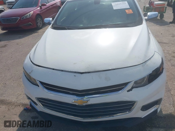 2018 Chevrolet Malibu LT z VIN 1G1ZD5ST9JF125831, wystawiony jako IAAI lot #42443325 z przebiegiem Nie podano mil oraz . Historia ofert i sprzedaży dostępna na DreamBid. Obrazek 10.