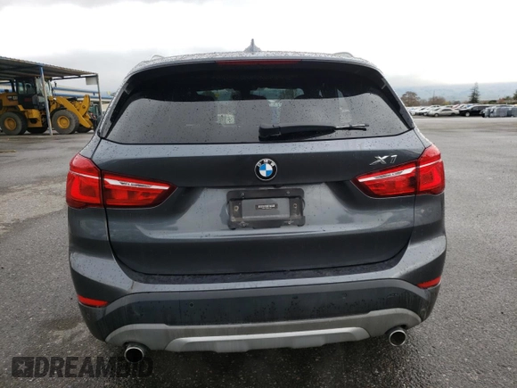 2018 BMW X1 xDrive28i with VIN WBXHT3C33J5K23187, listed as a Copart auction lot 71063192 with 97,403 mi miles. Bid and sale history available at carsss.com. Image 6.