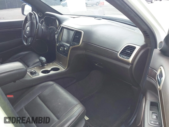 2014 Jeep Grand Cherokee Summit with VIN 1C4RJFJT2EC501235, listed as a IAAI auction lot 42622790 with 160,000 mi miles and . Bid and sale history available at DreamBid. Image 5.