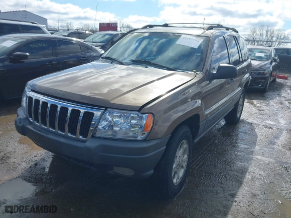 2001 Jeep Grand Cherokee Laredo with VIN 1J4GW48S21C572272, listed as a IAAI auction lot 41695754 with 169,229 mi miles. Bid and sale history available at carsss.com. Image 17.