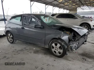 2003 Ford Focus ZX3 with VIN 3FAFP31Z73R178518, listed as a Copart auction lot 50200105 with 317,147 mi miles and Salvage title. Bid and sale history available at DreamBid. Image 4.