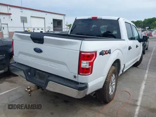 2019 Ford F-150 XL with VIN 1FTEW1E53KFD17091, listed as a IAAI auction lot 42320554 with 166,961 mi miles and . Bid and sale history available at DreamBid. Image 4.