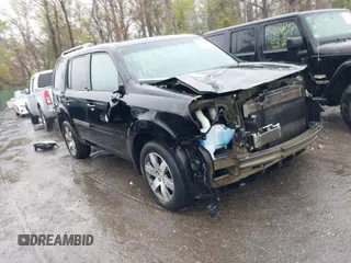 2014 Honda Pilot Touring with VIN 5FNYF4H91EB055741, listed as a IAAI auction lot 42006752 with 222,308 mi miles and . Bid and sale history available at carsss.com. Image 1.