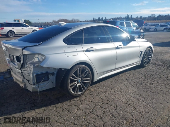 2015 BMW 4 Series 428i with VIN WBA4A5C58FG051293, listed as a IAAI auction lot 41255541 with 60,737 mi miles and . Bid and sale history available at DreamBid. Image 4.