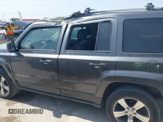 2016 Jeep Patriot Latitude with VIN 1C4NJRFB7GD658594, listed as a IAAI auction lot 42066483 with 146,492 mi miles. Bid and sale history available at carsss.com. Image 14.
