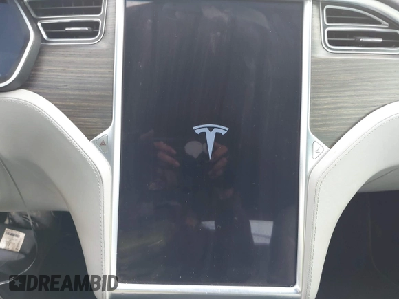 2016 Tesla Model S 70 with VIN 5YJSA1E11GF124965, listed as a IAAI auction lot 41458132 with Not provided miles and . Bid and sale history available at DreamBid. Image 18.