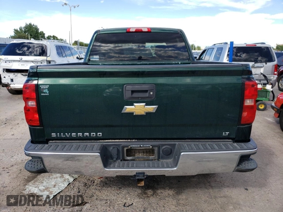 2015 Chevrolet Silverado 1500 LT with VIN 3GCUKREC5FG220516, listed as a Copart auction lot 68086854 with 186,924 mi miles and Salvage Title. Bid and sale history available at DreamBid. Image 6.